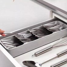 Cutlery tray box neatly arranged with different utensil types