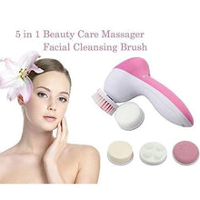 Multi-function body and facial massager in pink.