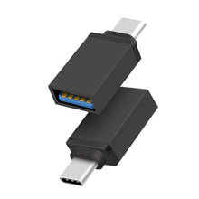 Type-C OTG adapter for data transfer and charging.