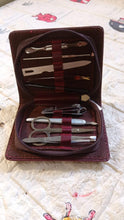 Nail grooming kit with leather travel case