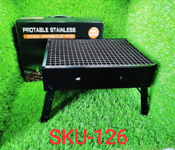 Black folding barbeque grill with side handles