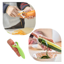 Multi-functional stainless steel peeler designed for easy peeling of fruits and vegetables.